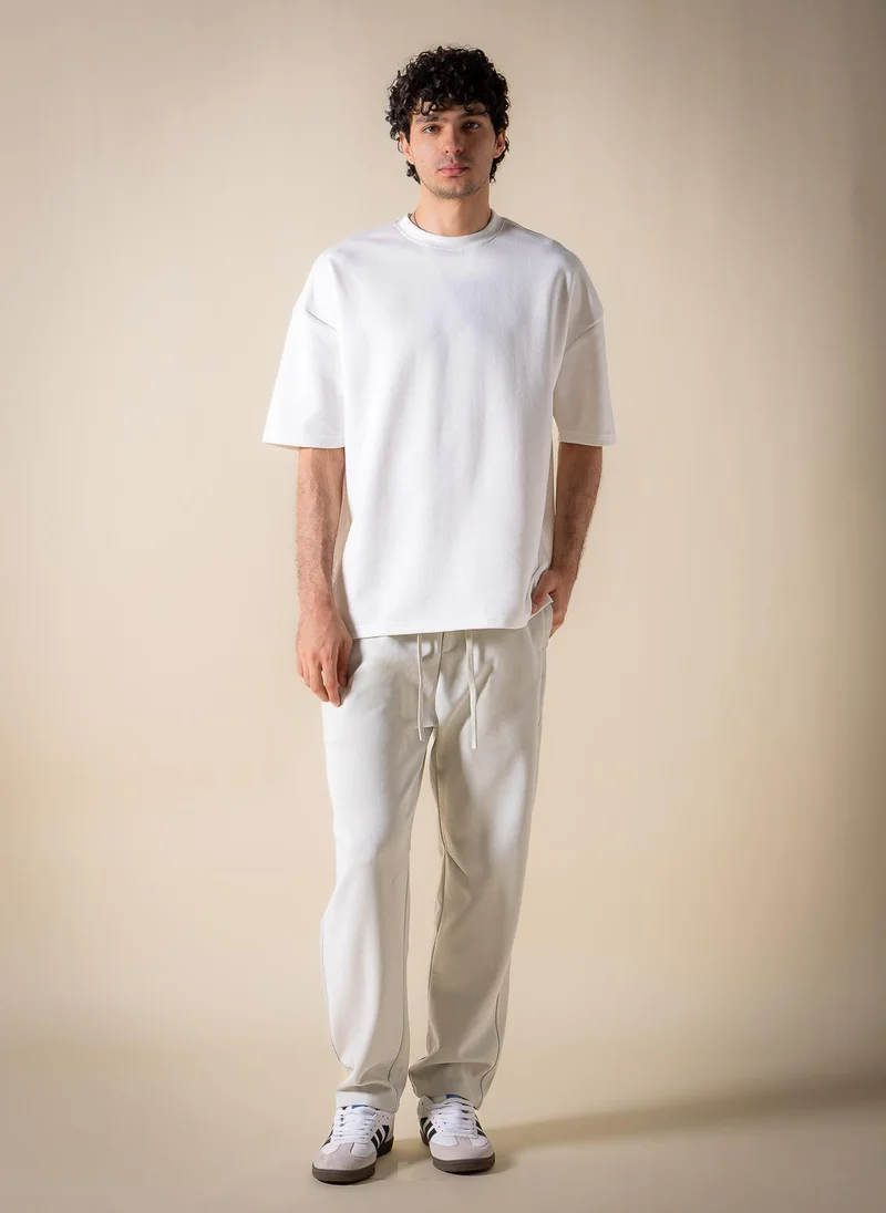 SHAPES TEXTURED JOGGER-WAIST TROUSERS
