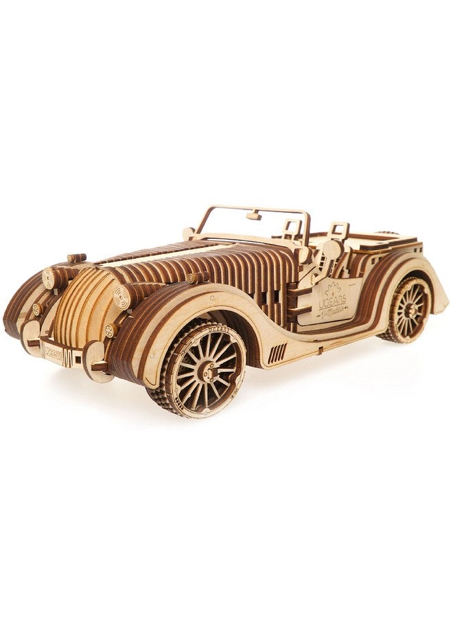 أوجيرز لعبة Ugears Roadster VM-01 | أحجية تروس خشبية | مجموعات STEM DIY للكبار | أحجية تعمل بمقبض يدوي، مركبات عملية مزودة بمكابس وعجلات وممتصات صدمات | مجموعة تعليمية، أحجية تروس ميكانيكية - Image 1