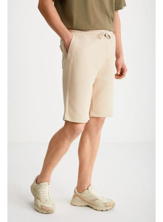 GRIMELANGE Camillo Men's Zipper Pocket Elastic Waist Beige Shorts & Bermuda