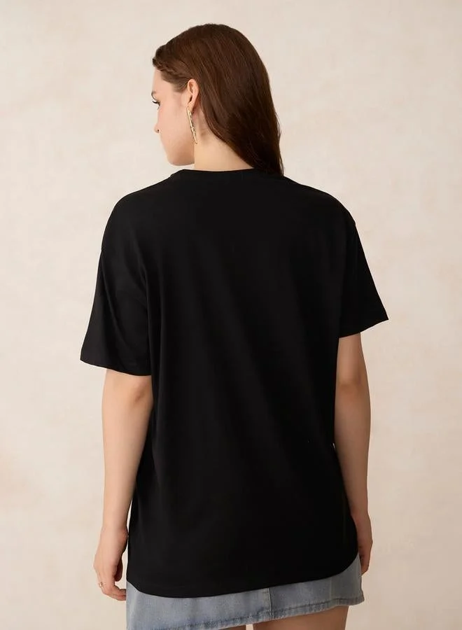 Outzidr  Black Graphic Oversized T-Shirt for Women | Best Price UAE