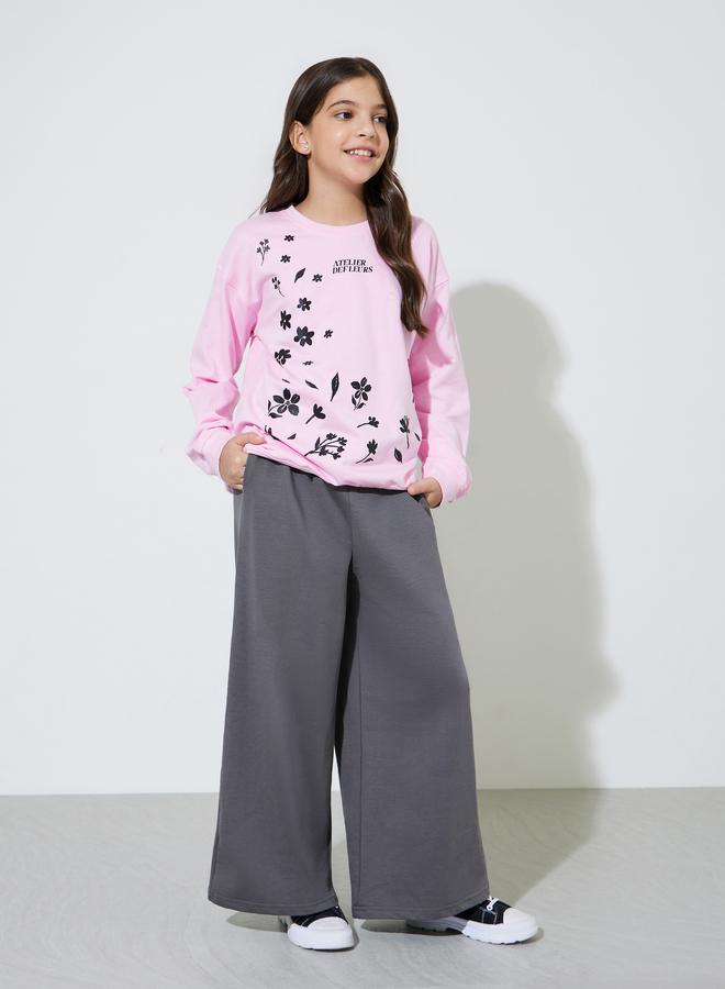Styli Teen Girls Pink Graphic Print Sweatshirt and Grey Wide Leg Joggers Set - Image 1