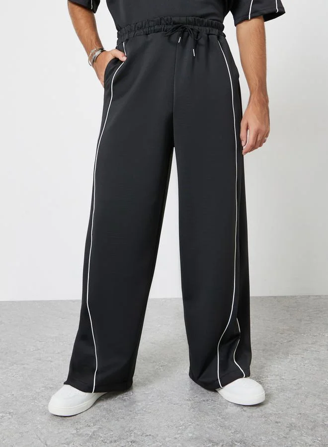 Styli  Men Black Oversized Piping Detail T-Shirt and Pants Co-Ords for Men | Best Price UAE
