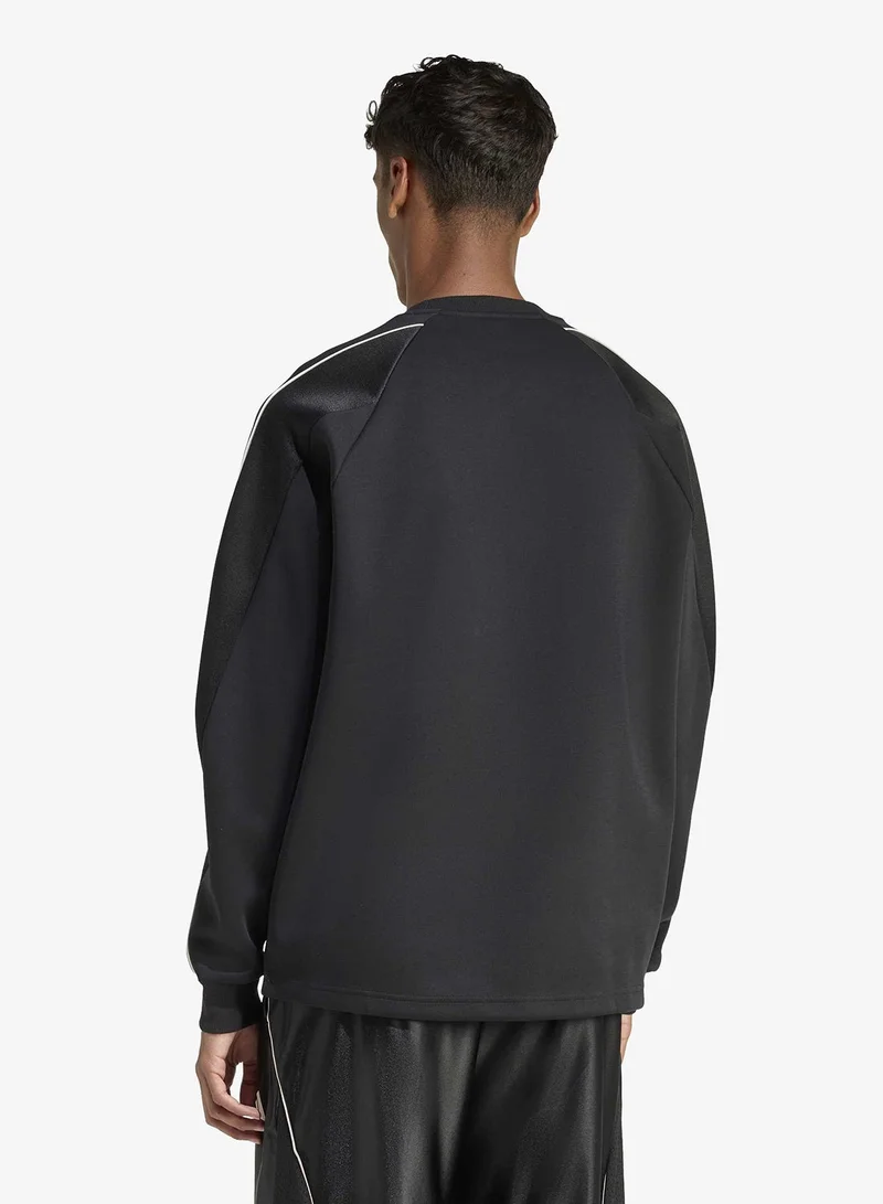 اديداس سترة بشعار الملعب