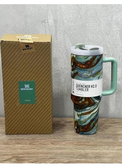 Stanley 1.18L Vacuum Insulated Stainless Steel Thermal Mug. Featuring a stylish marble design and a comfortable mint handle, this mug is perfect for storing water and iced tea. (Green Marble)  - Image 2