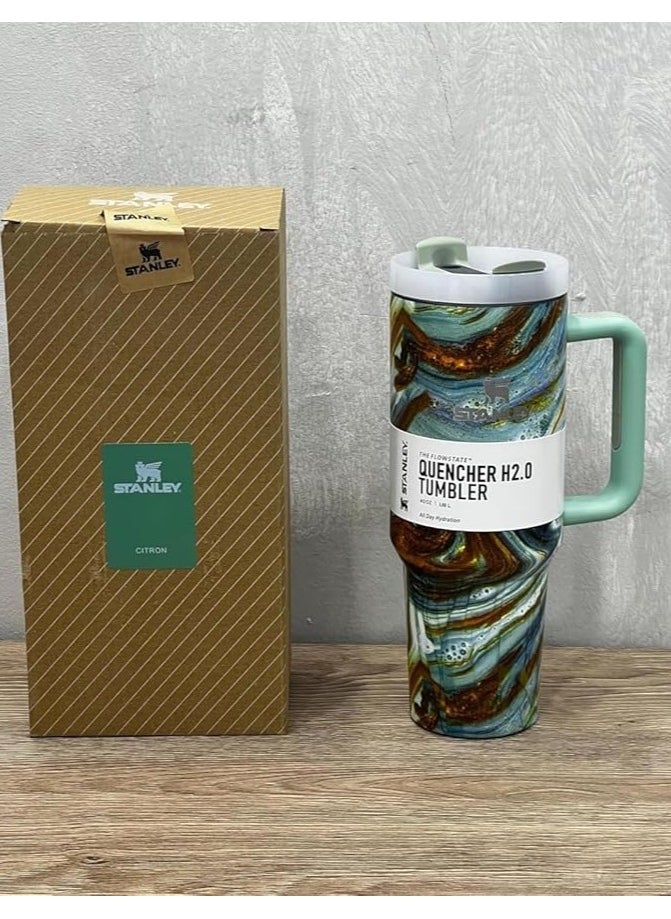 Stanley 1.18L Vacuum Insulated Stainless Steel Thermal Mug. Featuring a stylish marble design and a comfortable mint handle, this mug is perfect for storing water and iced tea. (Green Marble)  - Image 2