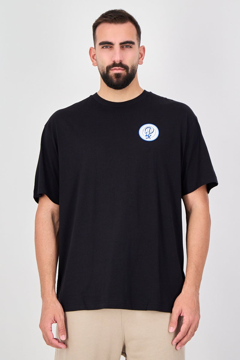 PUMA Men Relaxed Fit Short Sleeve Outdoor T-Shirt, Black - Image 1