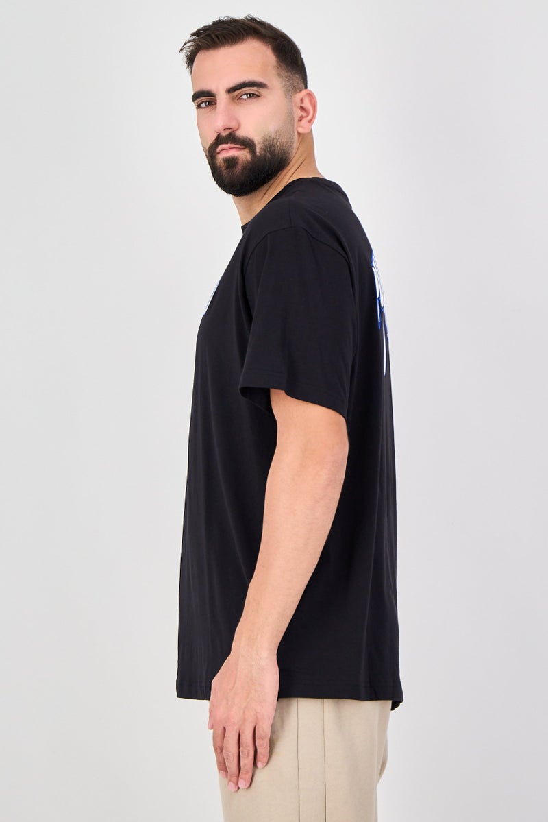 PUMA Men Relaxed Fit Short Sleeve Outdoor T-Shirt, Black - Image 2