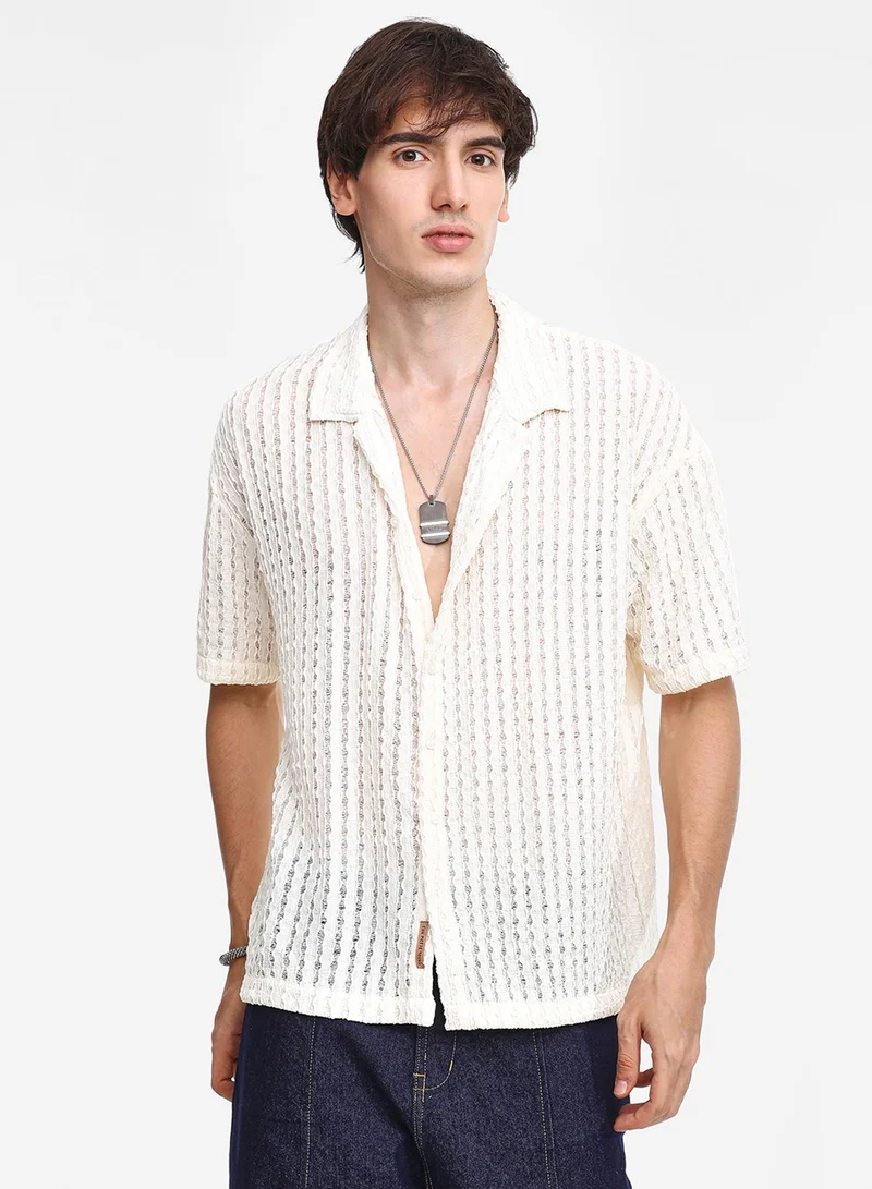 Campus Sutra Men's Cream White Striped Knit Oversized Shirt For Casual Wear | Cuban Collar | Short Sleeve | Button Closure | Oversized Shirt Crafted With Comfort Fit For Everyday Wear