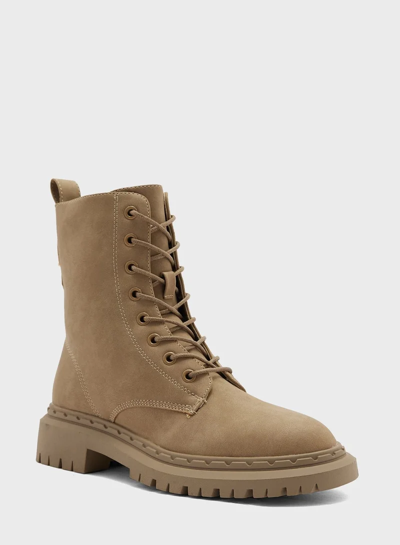 ترافل من نمشي Faux Suede Military Boots
