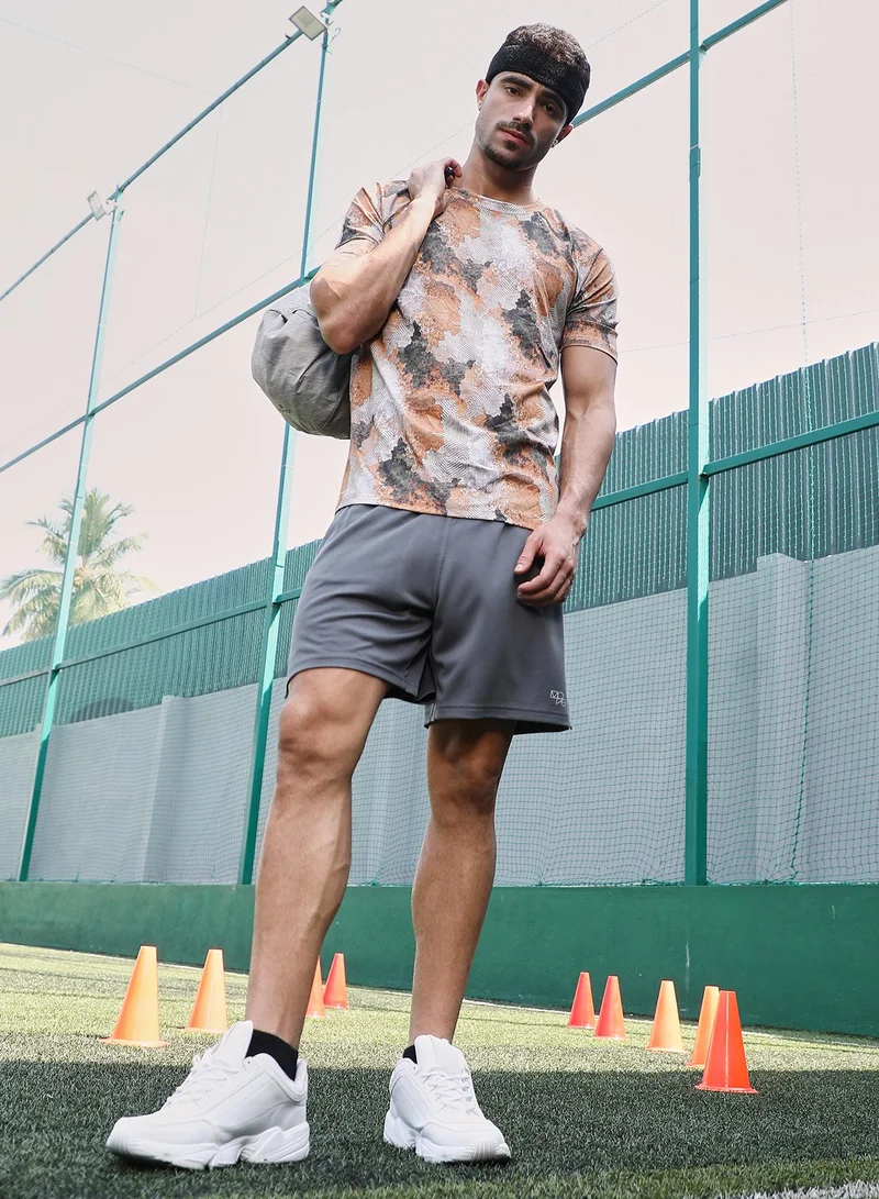 Campus Sutra Campus Sutra Men's Charcoal Black & Rust Orange Blur-Imprint Activewear T-Shirt For Casual Wear | Crew Neck | Short Sleeves | Jersey T-Shirt Crafted With Comfort Fit For Everyday Wear