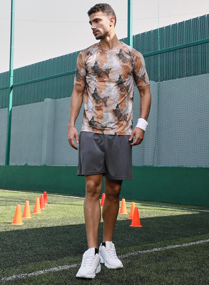 Campus Sutra Campus Sutra Men's Charcoal Black & Rust Orange Blur-Imprint Activewear T-Shirt For Casual Wear | Crew Neck | Short Sleeves | Jersey T-Shirt Crafted With Comfort Fit For Everyday Wear