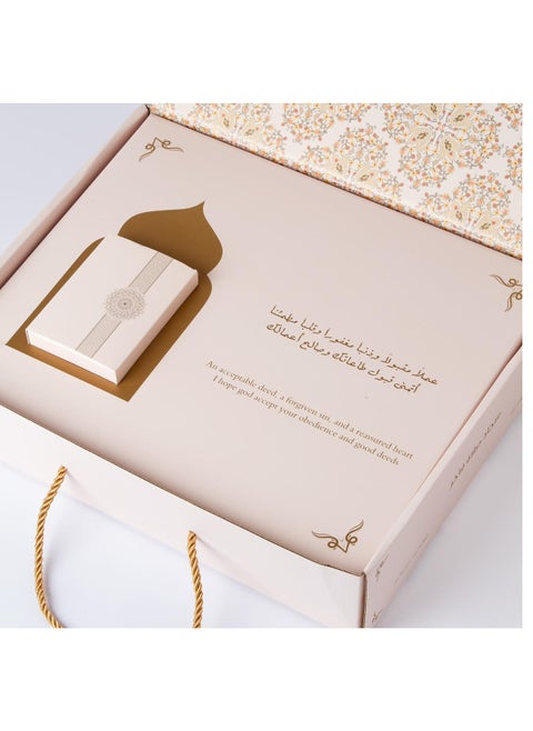 A box of luxuriously decorated wool prayer rug with two perfume bottles