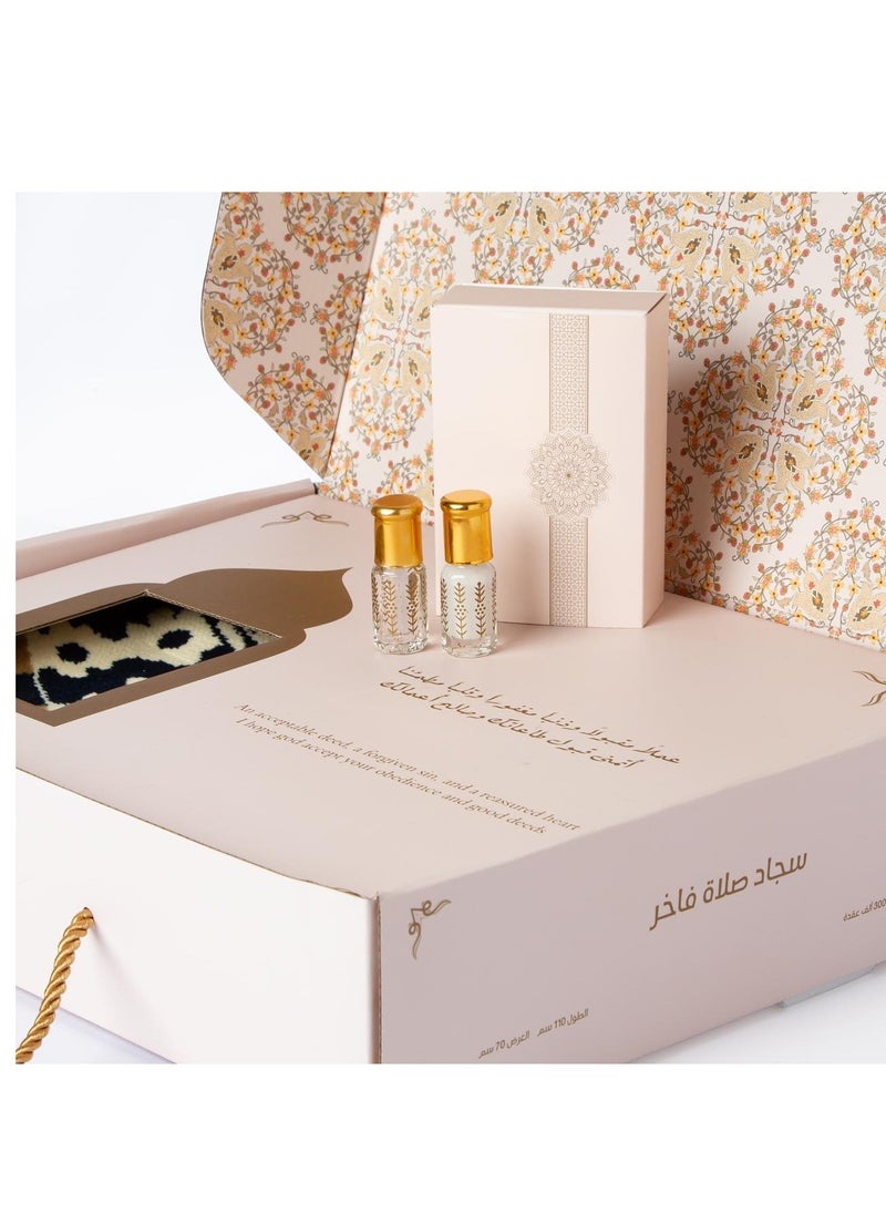 A box of luxuriously decorated wool prayer rug with two perfume bottles