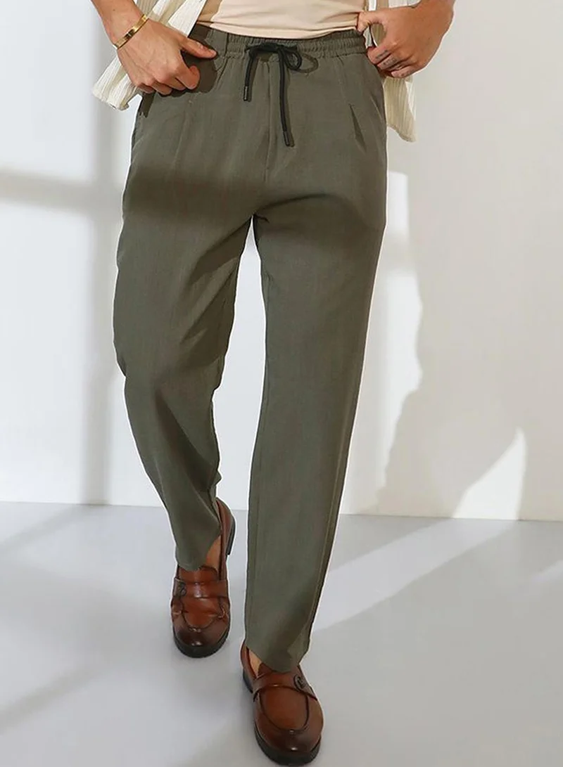 Campus Sutra Campus Sutra Men's Olive Green Straight-Fit Linen-Blend Trousers For Casual Wear | Mid-Rise | 2 Pockets | Drawstring Closure | Trousers Crafted With Comfort Fit For Everyday Wear