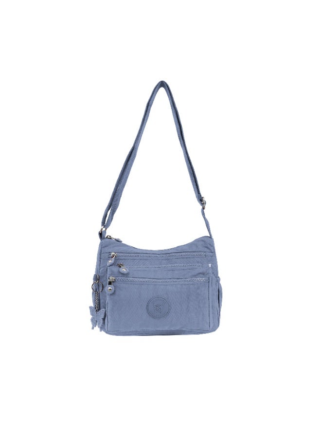 Caprice Collection Unisex Medium Crossbody Bag – Waterproof Nylon, Lightweight & Compact, Light Blue - Image 1