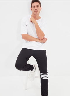 Stripe Cuffed Sweatpants - pzsku/Z4BF51CF3AEF403A6A17CZ/45/_/1730980277/be1a3191-963e-484e-8101-da9047960d3f