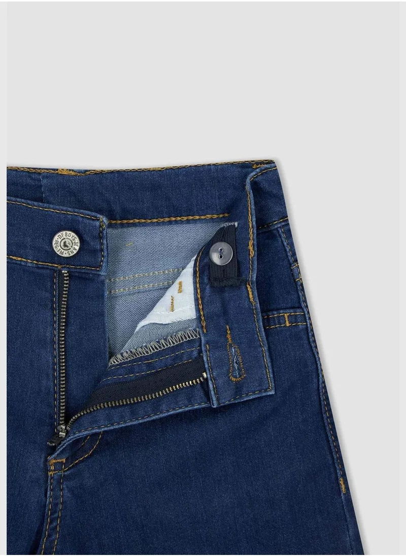 ديفاكتو Distressed Mini Jean Shorts