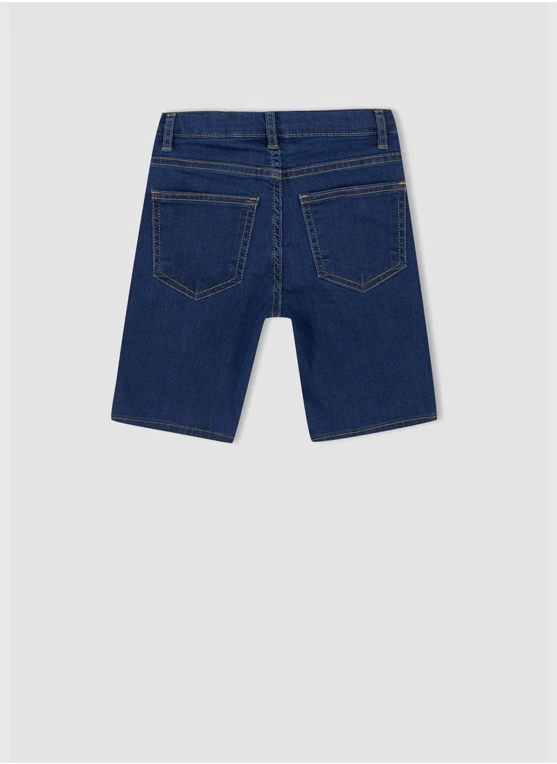 ديفاكتو Distressed Mini Jean Shorts