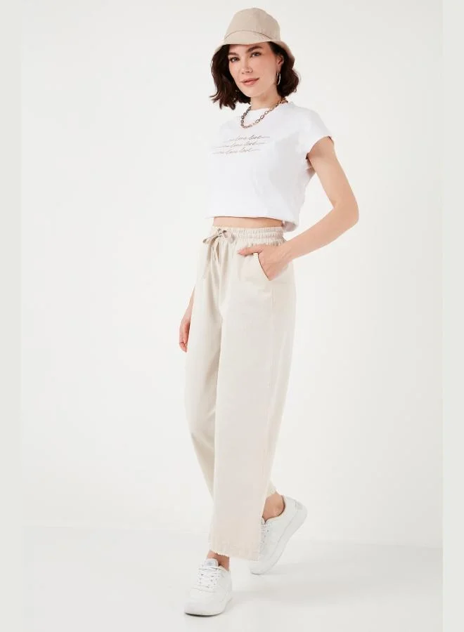 ليلا بنطلون نسائي واسع الساق بخصر عالٍ من قطن ليلا بجيوب