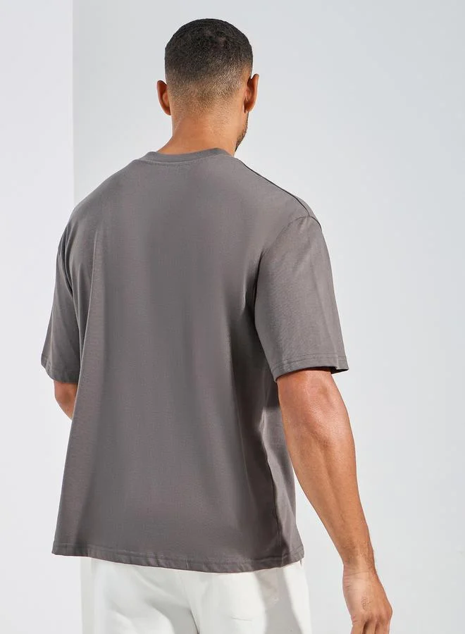 Styli Minimal Chest Embroidered Oversized Cotton Rich T-Shirt