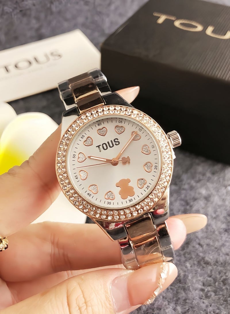ساعة TOUS للسيدات بعلامات قلب مزينة بالكريستال مع حزام بلون ذهبي وردي وفضي