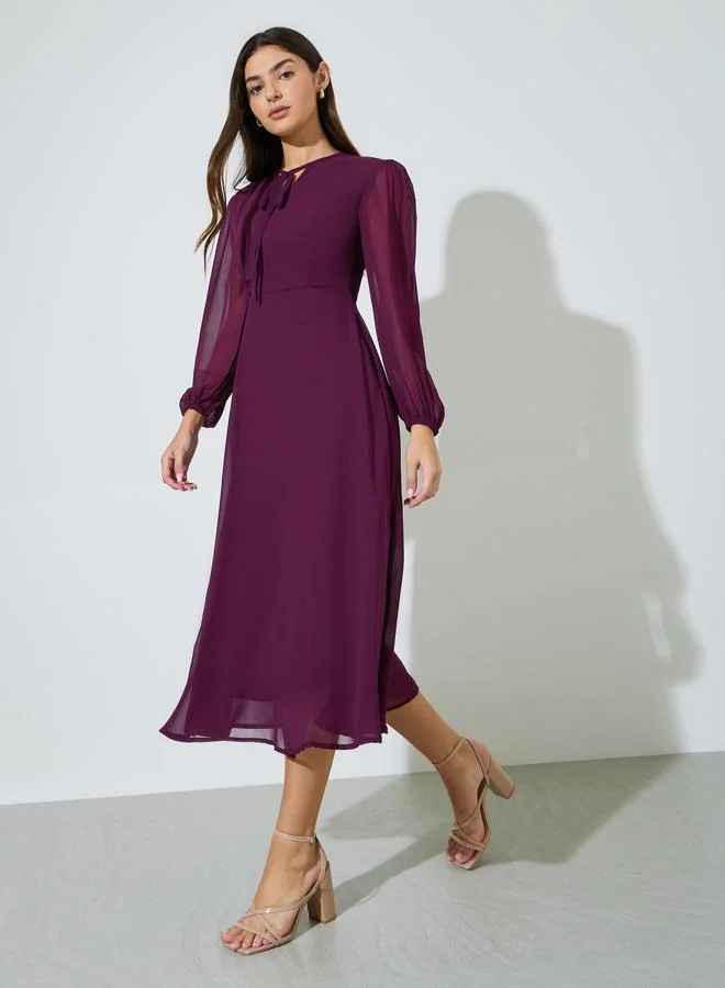 Styli  Magenta Solid Tie-Up Neck A-Line Midi Dress for Women | Best Price UAE