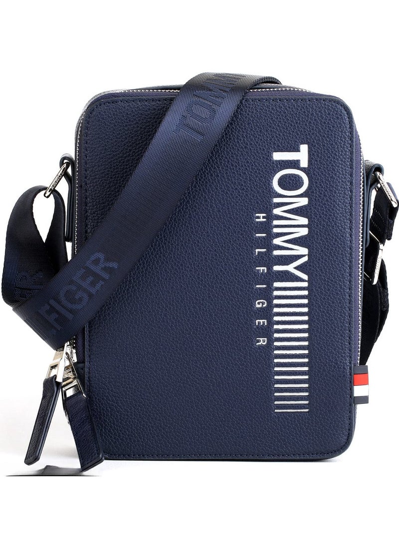 Tommy Hilfiger Plus "Trendy and Functional Blue Crossbody Bag: Ideal for Everyday Use with a Modern Design, Adjustable Strap for Personalized Comfort, Spacious Interior with Multiple Organizational Pockets, Durable Construction for Long-Term Use, and a Vibrant Blue Color That Adds a Pop of Style to Any Outfit or Occasion, from Casual Errands to Special Events"  - Image 1