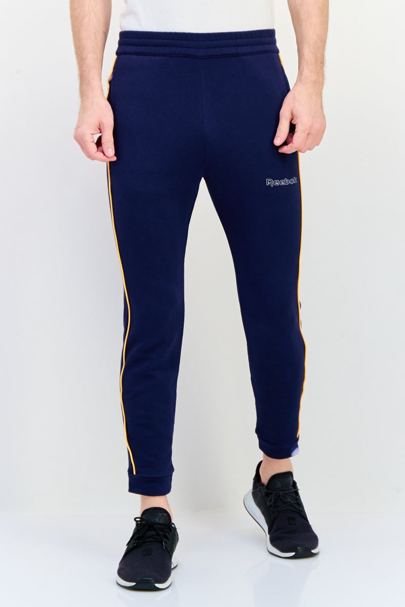 Reebok سروال رياضي للرجال مناسب في الهواء الطلق، أزرق داكن - Image 1