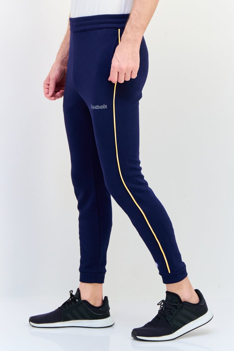 Reebok سروال رياضي للرجال مناسب في الهواء الطلق، أزرق داكن - Image 3