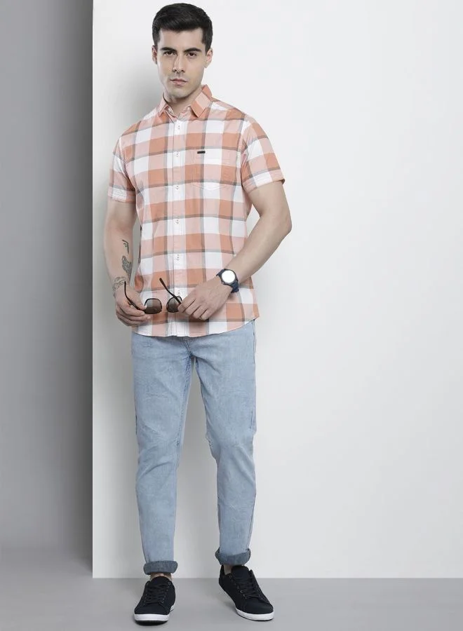 شركة المرآب الهندية Men Slim Straight Fit Solid Mid-Rise Stretchable Jeans