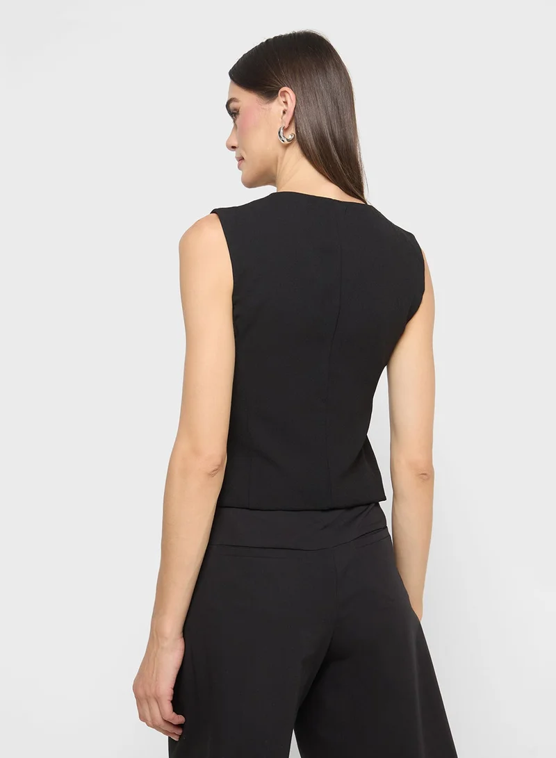 ايلا بلوزة فيست بأزرار غير متماثلة