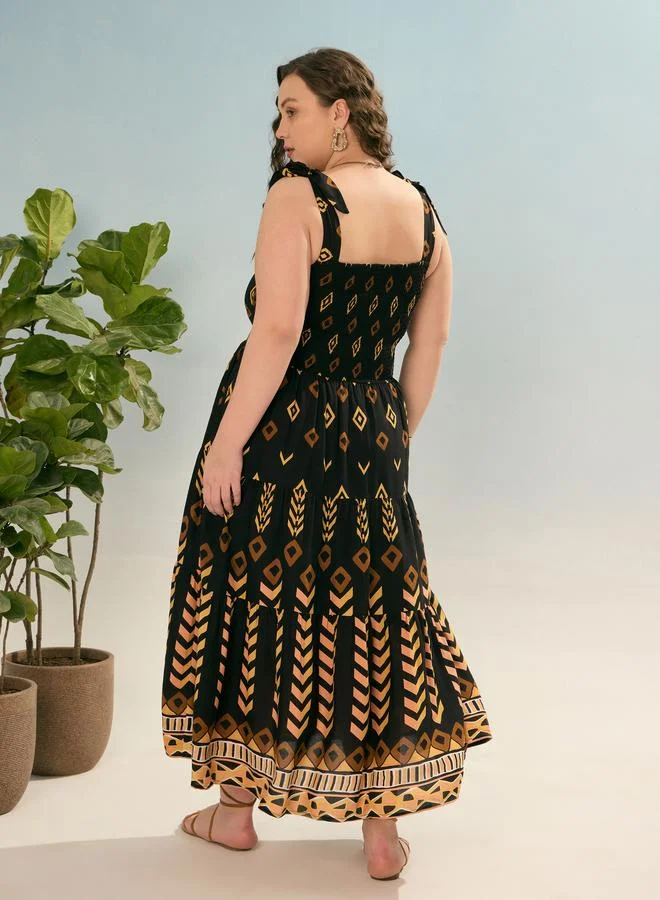 SASSAFRAS Plus Black Geometric Tie Up Tiered Maxi Dress