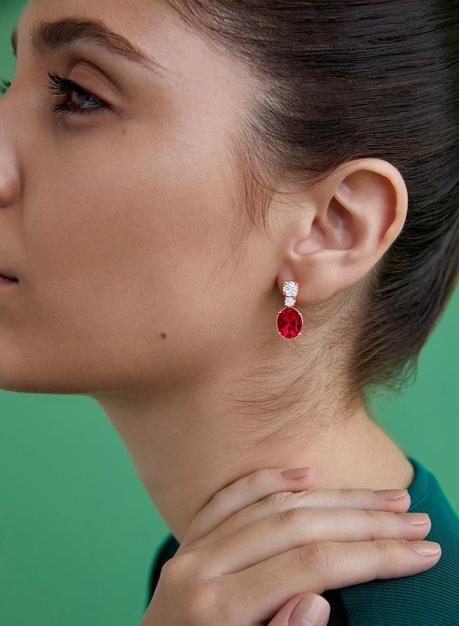 مينوتيا أقراط مينوتيا الحمراء البيضاوية المرصعة بحجر سوليتير أبيض مرصعة بكريستال سوليتير للنساء والفتيات (مطلية بالذهب الوردي) - Image 5