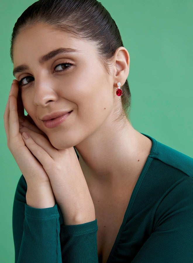 مينوتيا أقراط مينوتيا الحمراء البيضاوية المرصعة بحجر سوليتير أبيض مرصعة بكريستال سوليتير للنساء والفتيات (مطلية بالذهب الوردي) - Image 3