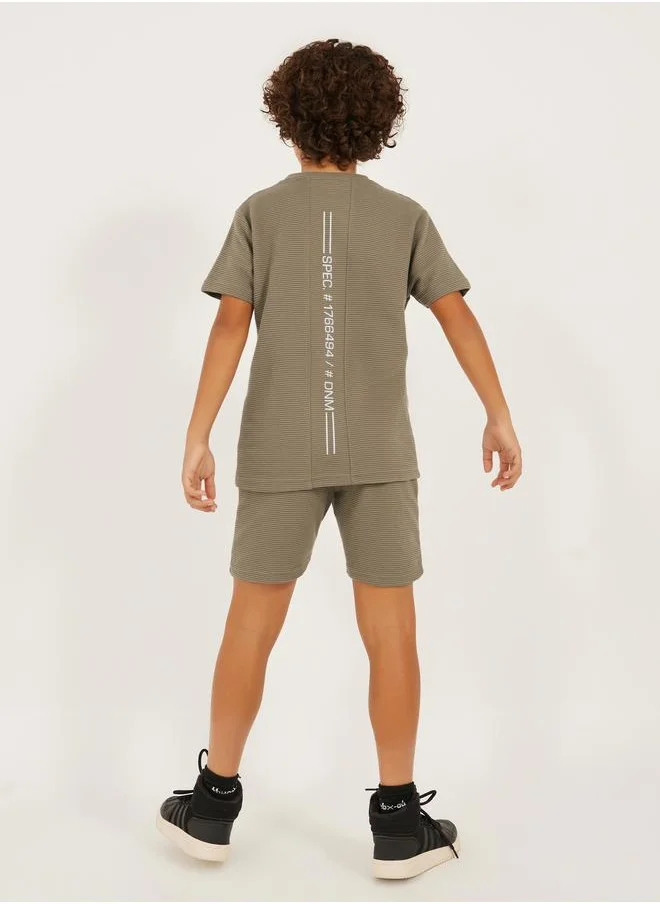 ستايلي Styli Textured T-Shirt Detail and Shorts with Badge Set