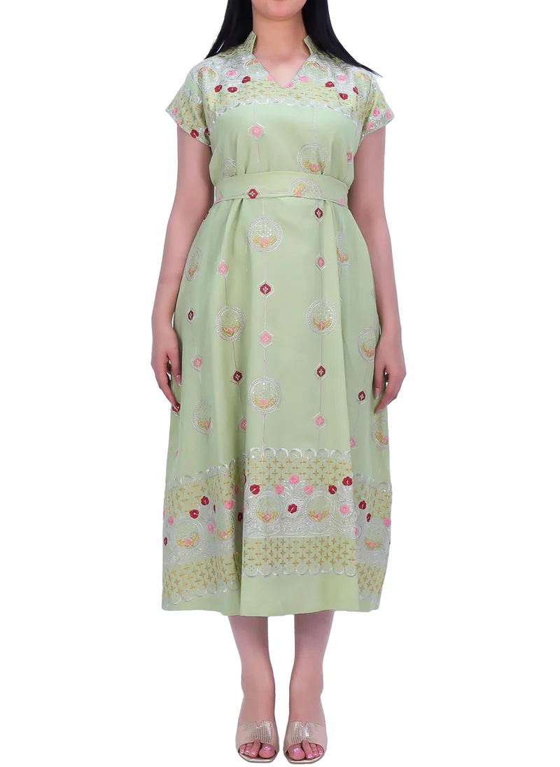 In Love Elegant dress made of lightweight fabric in multiple colors with golden and red embroidery.