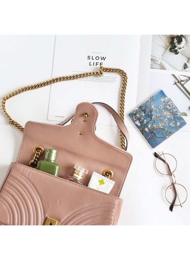 داينيبي مرآة صغيرة الحجم من Dynippy مقاس 3.15 بوصة، مزدوجة الجوانب، مكبرة 1X/2X، مصنوعة من جلد البولي يوريثان، مرآة دائرية للحقائب، مرآة جيب صغيرة محمولة باليد للنساء والأم (زهر اللوز) - Image 4