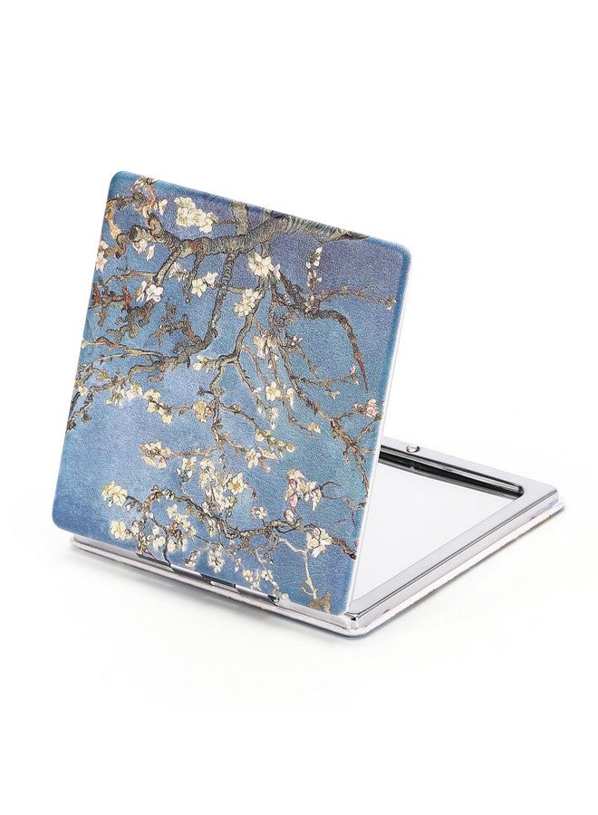 داينيبي مرآة صغيرة الحجم من Dynippy مقاس 3.15 بوصة، مزدوجة الجوانب، مكبرة 1X/2X، مصنوعة من جلد البولي يوريثان، مرآة دائرية للحقائب، مرآة جيب صغيرة محمولة باليد للنساء والأم (زهر اللوز) - Image 2