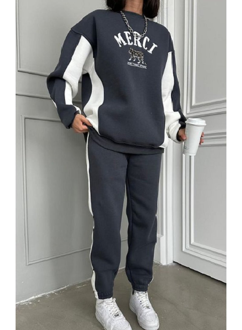 Black sports set with white accents featuring a modern and stylish design perfect  - Image 1