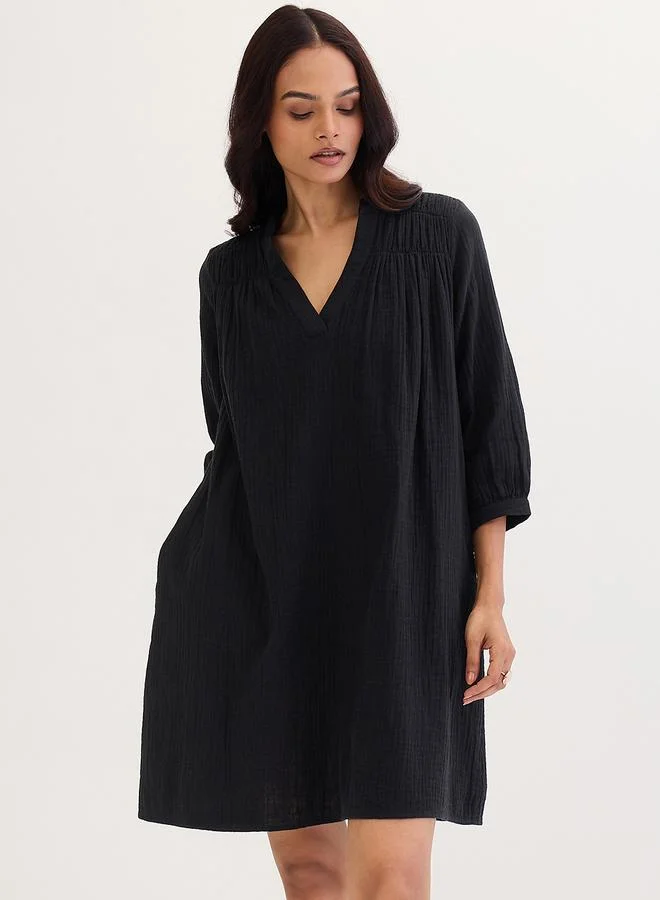 Femmella Black Textured Cotton Mini Dress