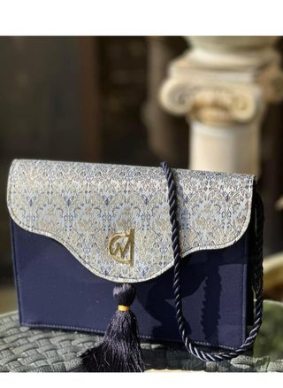 blue and white clutch bag with a tassel - pzsku/Z4C2DA3E323AF817AC039Z/45/_/1710792228/276cb383-5cc5-4c1a-a3c7-8c5ecd217772
