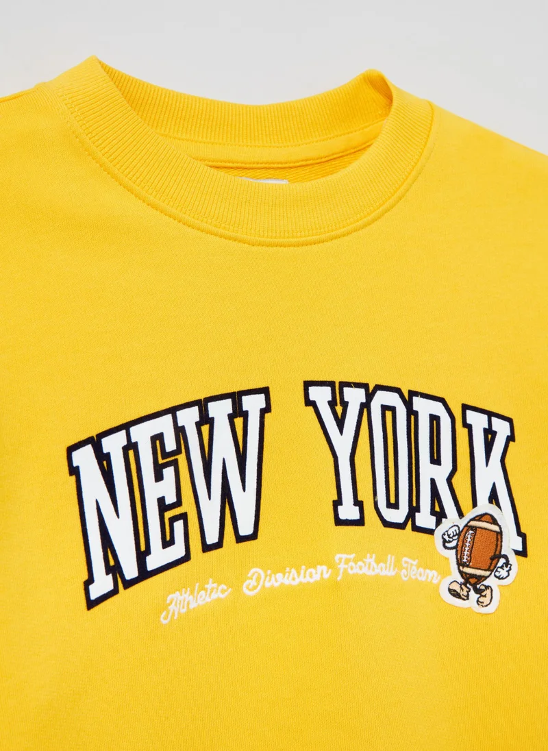 او في اس French terry sweatshirt with patch and print