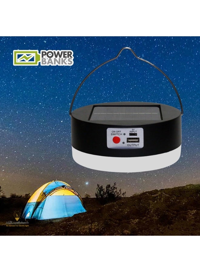 Hummer A portable hanging solar light that runs on solar energy, black shape, white flashlight color, with USB charging.  - Image 1
