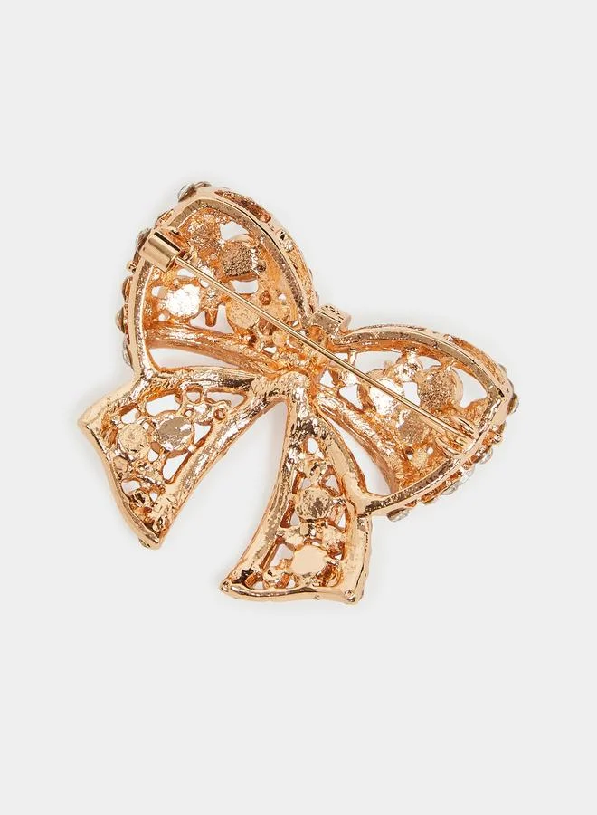 Styli Gold Bow Brooch with Crystals