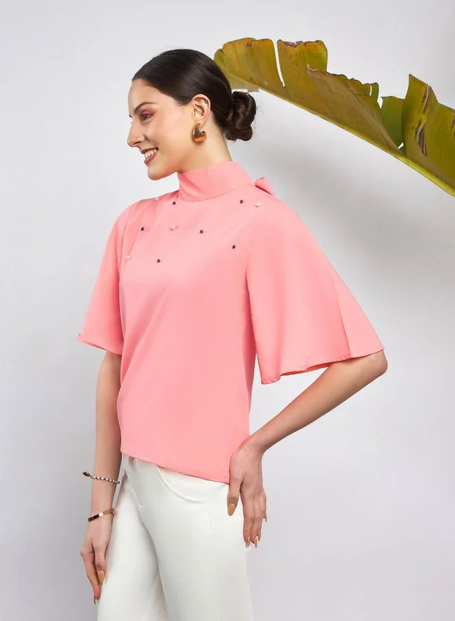 ساسافراس Faux Pearl Detail High Neck Tie Up Back Top by Styli