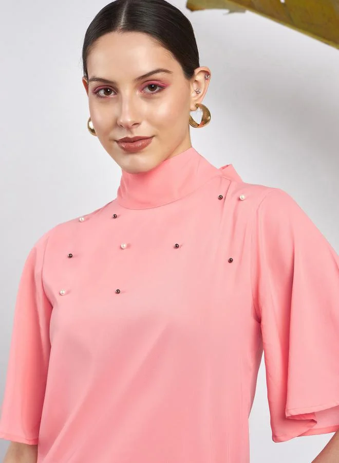 ساسافراس Faux Pearl Detail High Neck Tie Up Back Top by Styli