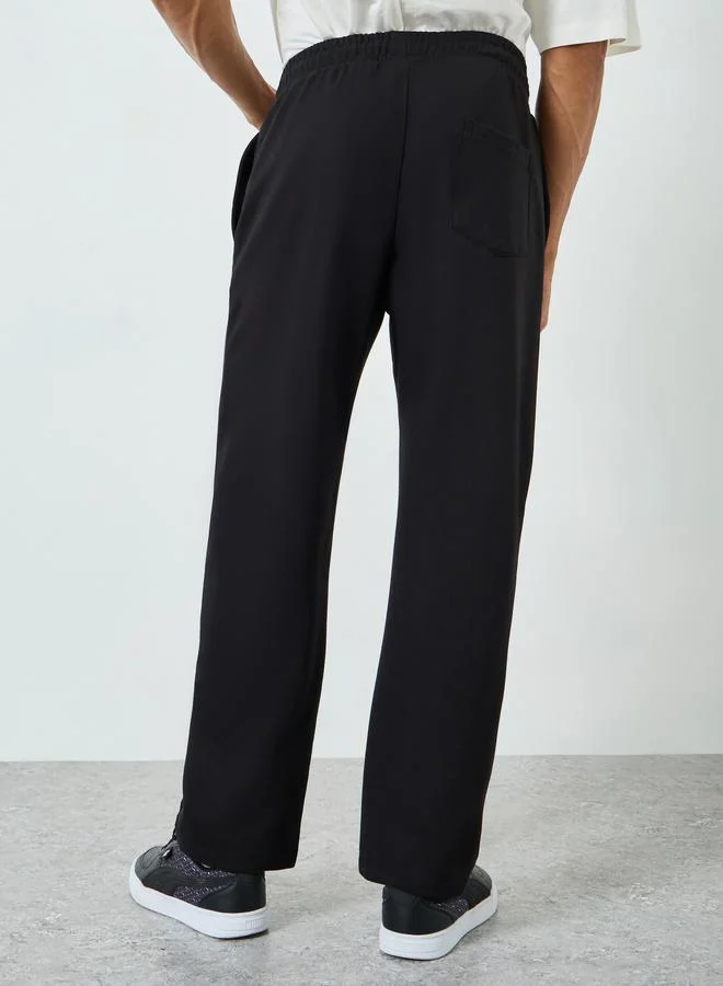 Styli  Men Black Graphic Print Relaxed Joggers for Men | Best Price UAE