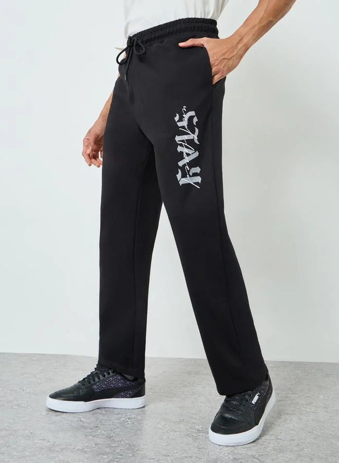 Men Black Graphic Print Relaxed Joggers