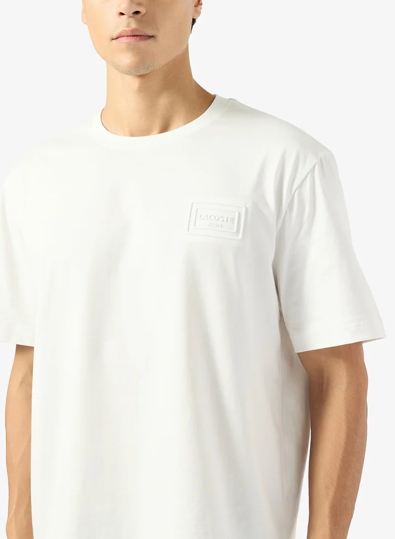 LACOSTE  Classic Fit Embossed T-Shirt for Men | Best Price UAE