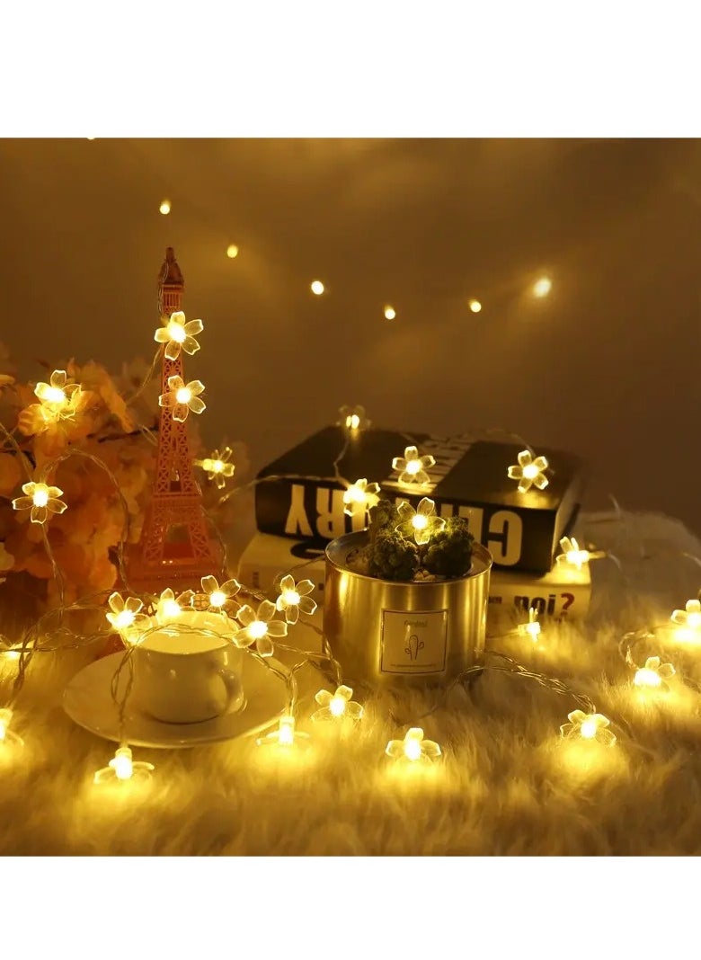 Oasis Casa 3M 20 LED Sakura Cherry Blossom String Lights – Warm White, Battery Operated (2x AA), Constant On, 3CM Floral Fairy Lights for Bedroom, Party, Wedding, Indoor Decoration  - Image 2